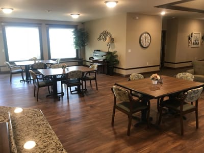 Common area with tables and chairs