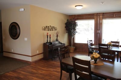 Interior common area with dining tables and decor