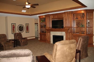 Common area with comfortable seating and fireplace.