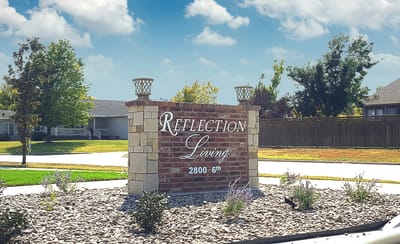 Signage for Reflection Living Wichita facility.