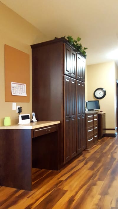Interior view of facility with cabinets and a desk