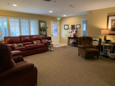 Cozy living room area with seating and decorations