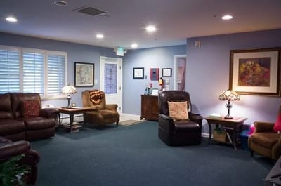 Cozy common area with comfortable seating and warm lighting