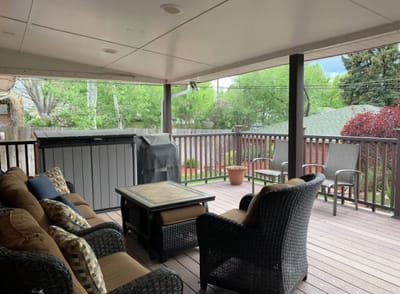 Outdoor seating area with chairs and table