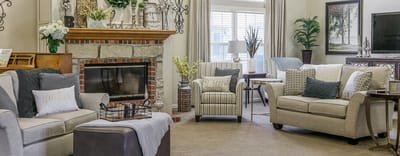 Cozy common area with seating and fireplace