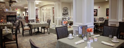 Dining area with tables set up for residents