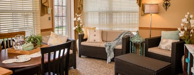 A cozy common area with seating and decor