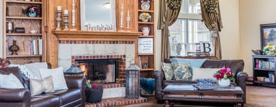 Cozy interior living area with a fireplace and comfortable seating
