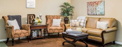 Warm and inviting common area with seating