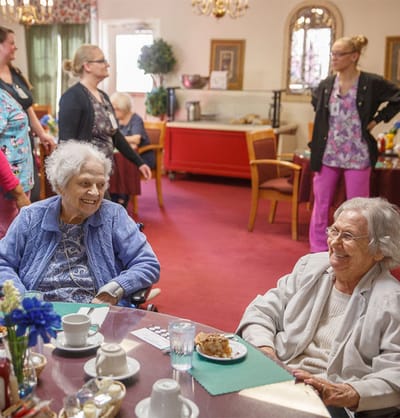 Residents enjoying conversation in a common area
