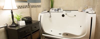 Accessible bathing area with tub and amenities