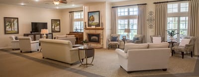 Common area with seating and fireplace