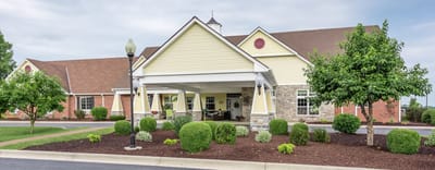 Exterior view of Bickford of Saginaw Township building with landscaping