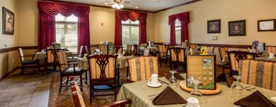 Dining room with set tables and decorations