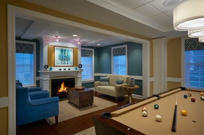Cozy common area with seating and a fireplace