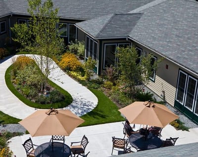 Aerial view of a landscaped courtyard with residents