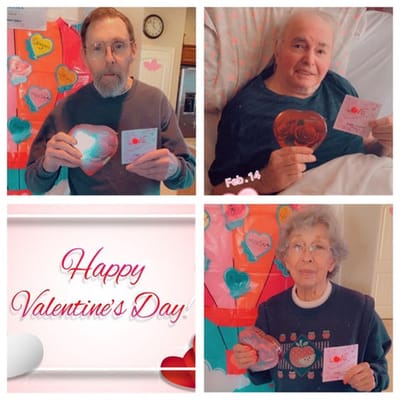 Residents celebrating Valentine's Day with crafts
