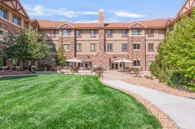 Outdoor view of the assisted living facility with garden space
