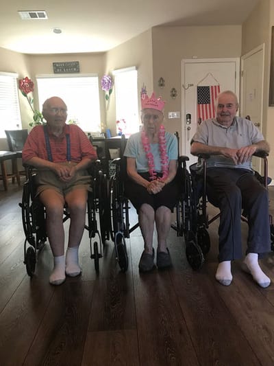 Residents celebrating with decorations in a common area