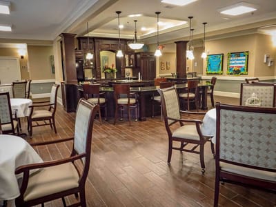Dining area with stylish seating and bar