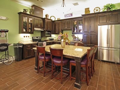 Bright kitchen area with an island and seating