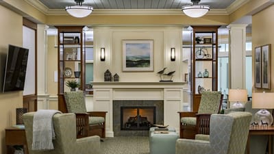 Common area with seating and a fireplace