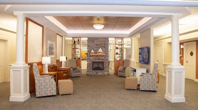 Common area with seating and a fireplace