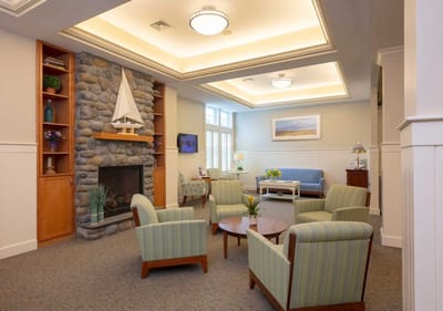 Common area with seating and a fireplace