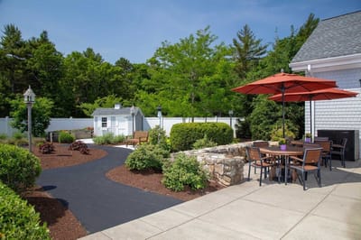 Outdoor garden area with seating and pathways