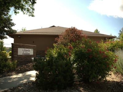 Exterior view of Volante Senior Living with landscaping