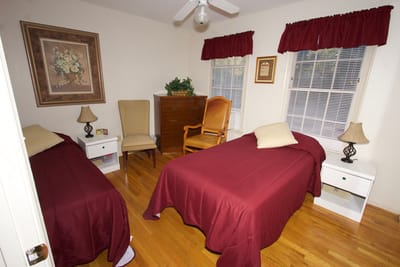 Cozy shared bedroom in an assisted living facility