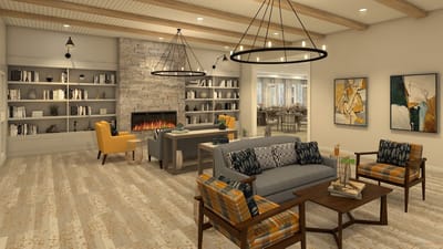 Cozy common area with seating and bookshelves