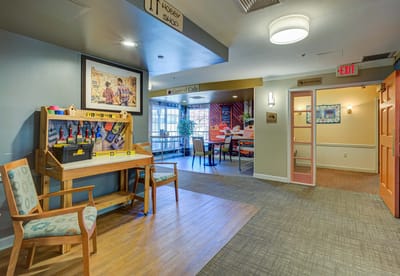 Interior view of a common area with seating and tables