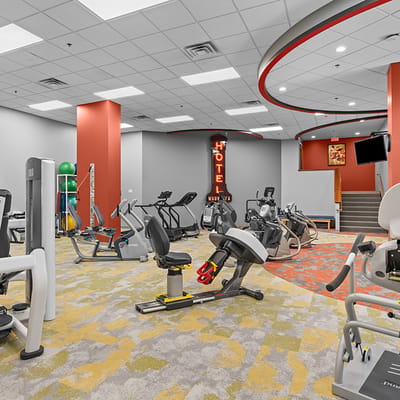 Interior view of a fitness room with exercise equipment