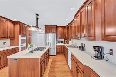 Modern kitchen with wooden cabinets and appliances