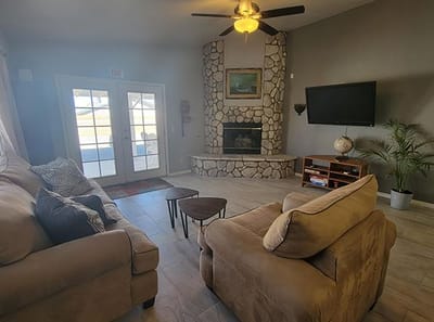 Cozy common area with seating and fireplace