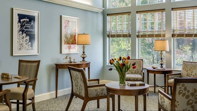 Bright and inviting common area with floral decor
