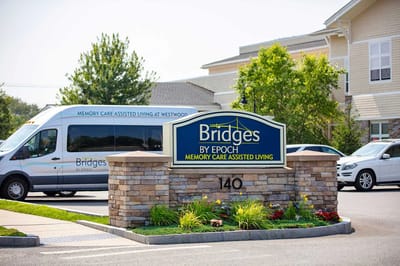 Exterior signage of Bridges by EPOCH facility with transport vehicle