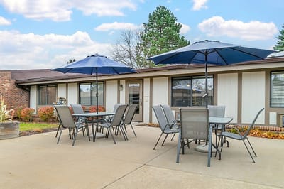 Outdoor patio seating area with umbrellas