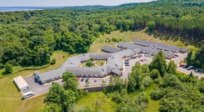 Aerial view of Brookridge Heights senior living facility surrounded by greenery
