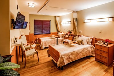 Interior view of a shared resident room with two beds