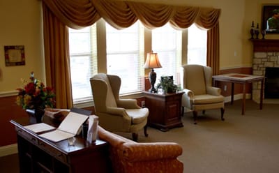 Bright, comfortable sitting area in a senior living facility