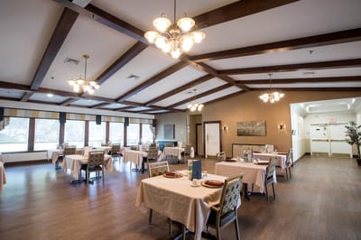 Dining room with tables set for meals