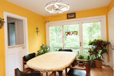 Bright dining area with a view of greenery