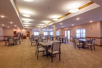 Interior dining area with tables and chairs