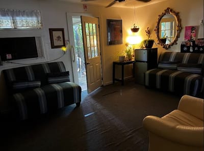 A cozy common area with seating and warm lighting