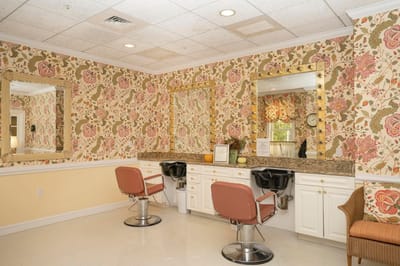 Interior view of a salon area with styling chairs