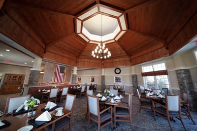 Dining room with elegant decor and an American flag