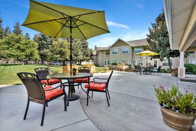 Outdoor seating area with umbrellas and tables
