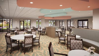 Dining room with circular tables and comfortable seating